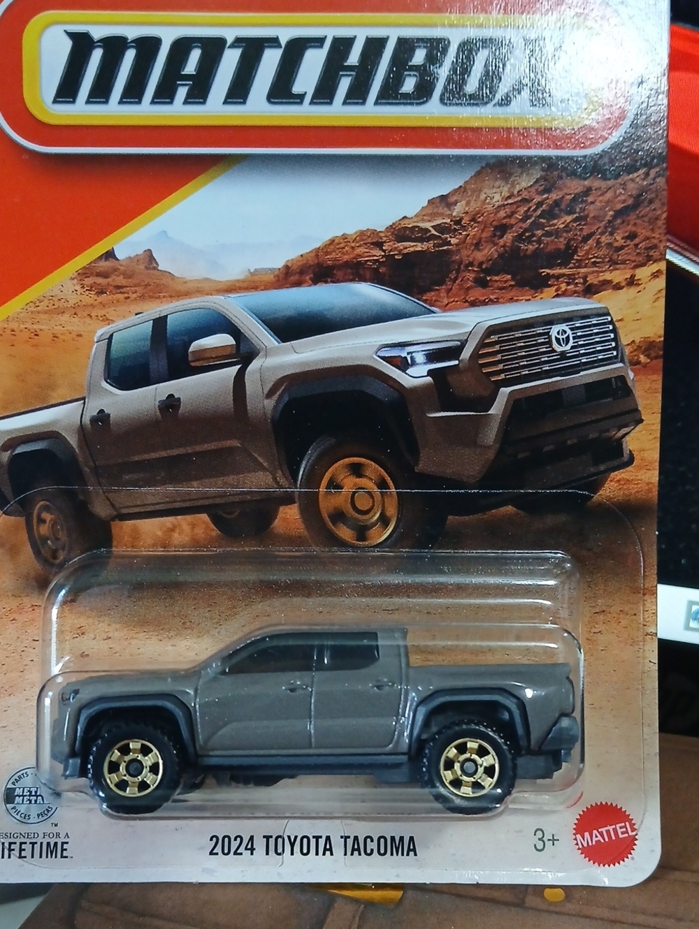 Matchbox 2024 Toyota Tacoma Die-Cast Truck - Gray with Gold Wheels